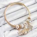 316L Çelik Beyaz Zirkon Taşlı Yıldız Göz Ve Yonca Model Gold Renk Charm Bileklik