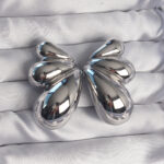 Pirinç Gümüş Renk İri Bombeli Kelebek Küpe