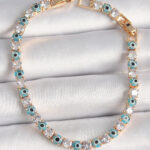 Pirinç Gold Renk Su Yolu Zirkon Taşlı Nazar Boncuklu Kadın Bileklik