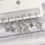 Pirinç Gümüş Renk Sallantı Zirkon Taşlı Deve Kuşu Figür Çoklu Kadın Küpe Seti