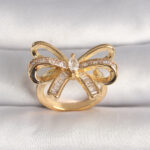 Pirinç Gold Renk Ayarlanabilir Zirkon Taşlı Kurdele Model Kadın Yüzük