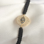 Pirinç Gold Renk Zirkon Taşlı Göz İşlemeli Figür Asansörlü Makrome Model Kadın Bileklik