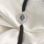 Pirinç Gümüş Renk Zirkon Taşlı Göz İşlemeli Figür Asansörlü Makrome Model Kadın Bileklik