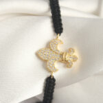 Pirinç Gold Renk Zirkon Taşlı Zambak Figür Asansörlü Makrome Model Kadın Bileklik