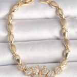 Pirinç Gold Renk Zirkon Taşlı Kelebek Figür Damla Zincir Model Kadın Bileklik