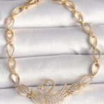 Pirinç Gold Renk Zirkon Taşlı Kuğu Figür Damla Zincir Model Kadın Bileklik