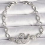 Pirinç Gümüş Renk Zirkon Taşlı Kuğu Figür Damla Zincir Model Kadın Bileklik