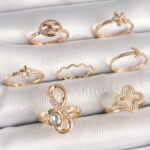 Pirinç Gold Renk Zirkon Taşlı Sonsuzluk Figür Yıldız Detay Kadın Yüzük Kombini