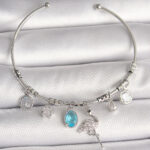 Pirinç Gümüş Renk Sallantı Zirkon Taşlı Filaminga Figür Charm Kadın Bileklik