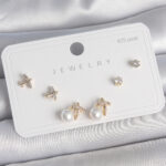 Pirinç Gold Renk Zirkon Taşlı Kelebek Model İnci Detay 925 Ayar Gümüş Çivi Kadın Küpe Seti