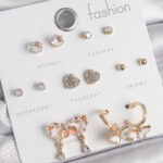 Pirinç Gold Renk Zirkon Taşlı Sallantılı Kalp Figür Kelebek Detay 7 Çift Kadın Küpe Seti