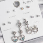 Pirinç Gümüş Renk Sallantı Zirkon Taşlı Kalp Model Düğüm Detay 7 Çift Kadın Küpe Seti