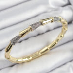 Pirinç Zirkon Taşlı Kemik Model Gold Renk Vip Kadın Bileklik