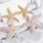 Pirinç Sallantılı Rainbow Deniz Yıldızı Model Gold Renk Hasır Küpe