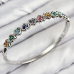 Pirinç Renkli Zirkon Taşlı Sıralı Kalp Model Gümüş Renk Kadın Kelepçe