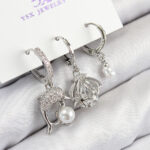 Pirinç Zirkon Taşlı 3'lü Yunus Balığı Ve İstiridye Model Gümüş Renk Kadın Küpe