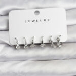 Gümüş Renk Pirinç Yıldız Modelli Kadın Küpe Seti