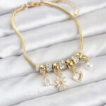 Pirinç Gold Renk Kutup Yıldızı ve Kalp Charmlı Kadın Bileklik