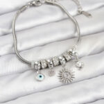 Pirinç Gümüş Renk Güneş Charmlı Kadın Bileklik