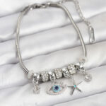 Pirinç Gümüş Renk Göz Model Charmlı Kadın Bileklik