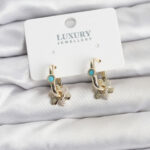 Mavi Taş Detaylı Pirinç Gold Renk Kadın Göçmen Küpesi