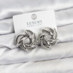 Gümüş Renk Pirinç Keskin Sarmal Model Kadın Küpe