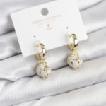 Pirinç Gold Renk Topçuk Model Mineli Halka Kadın Küpe