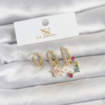 Pirinç Gold Renk Çiçek Model 3'lü Kadın Küpe
